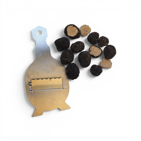 Fresh Tuber aestivum B Grade truffles showing small irregular whole specimens and a naturally cut interior