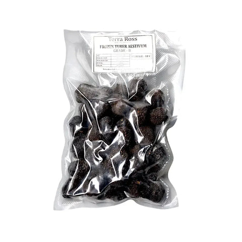 Bag of frozen summer truffles Tuber Aestivum B-grade for culinary use