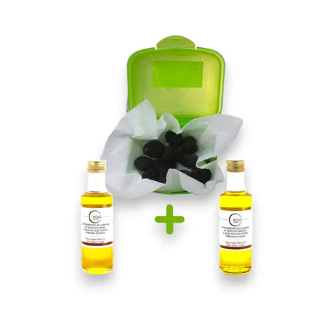 Green travel case with black charcoal and yellow oil bottles for Truffle Dog Training and truffle aroma