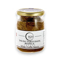Bílá sklenice tartufaty se zlatým víčkem představující produkt bílého lanýžového tartufata omáčky
