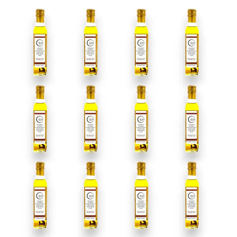 White Truffle Extra Virgin Olive Oil bottles with gold caps and labels, 250ml each